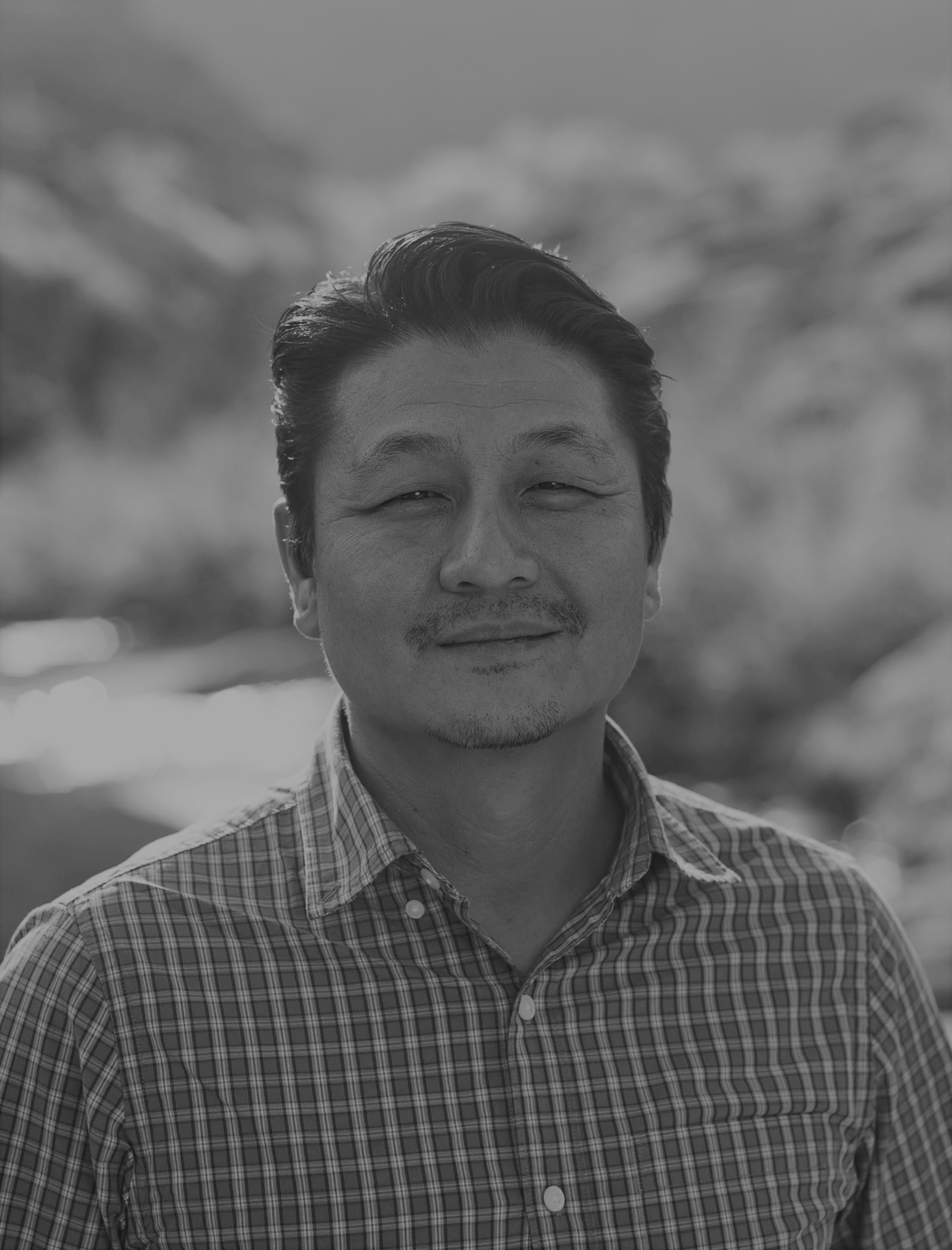 Portrait of author Shik Han